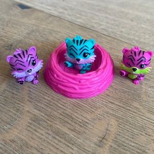 Hatchimals 3 little tigers in a nest.